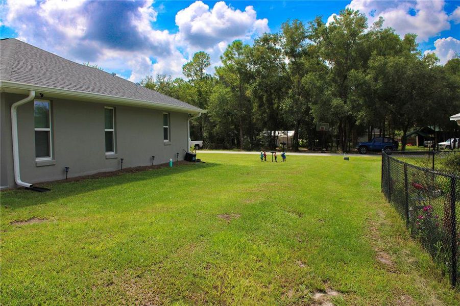 Exterior details and patio area of a home in , Summerfield (Image 26).