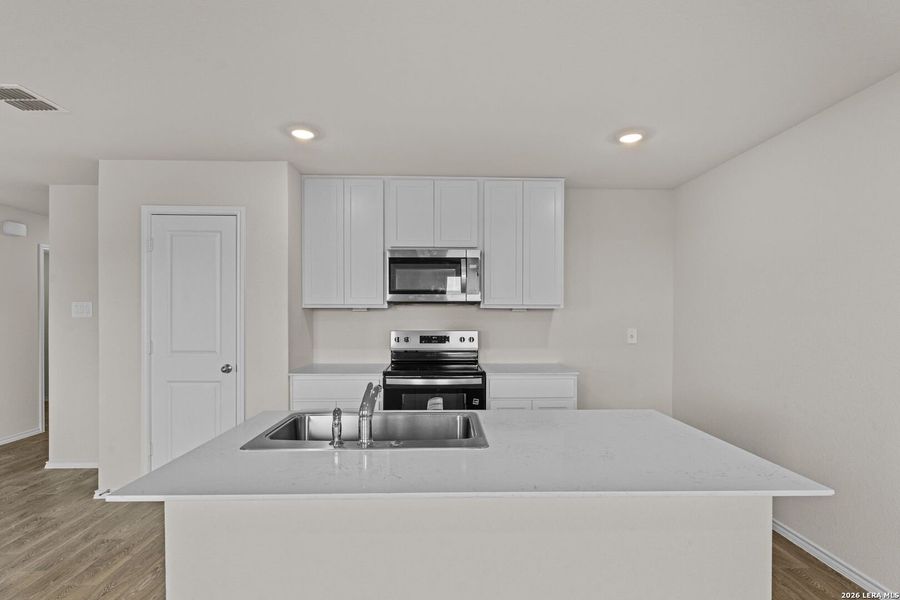 Furnished interior view inside a new home in Swenson Heights, Seguin (Image 7).