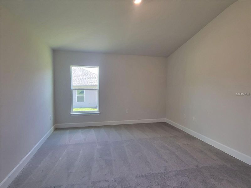 Spacious, unfurnished interior of a new home in Abbey Glen, Dade City (Image 15).