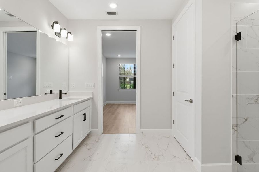 Furnished interior view inside a new home in Esplanade by the Islands Coach Homes, Naples (Image 8).
