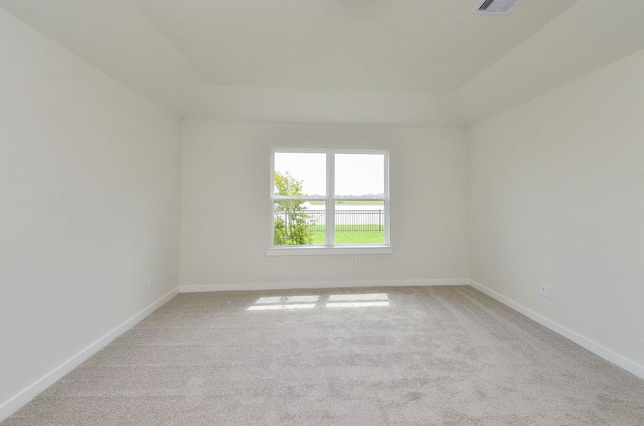 Spacious, unfurnished interior of a new home in Sunterra, Katy (Image 20).