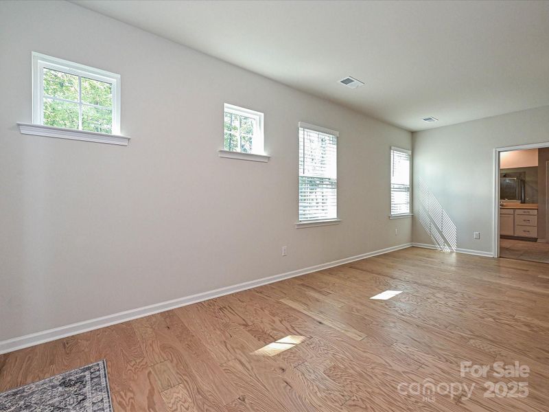 Primary Bedroom with Sitting Area Primary Bedroom with Sitting Area