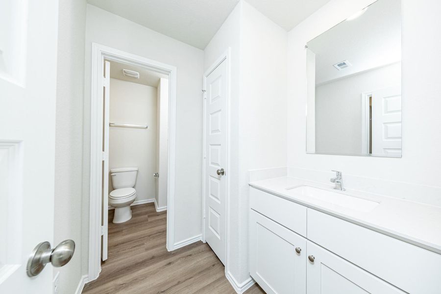 Furnished interior view inside a new home in Townsend Reserve, Splendora (Image 9).