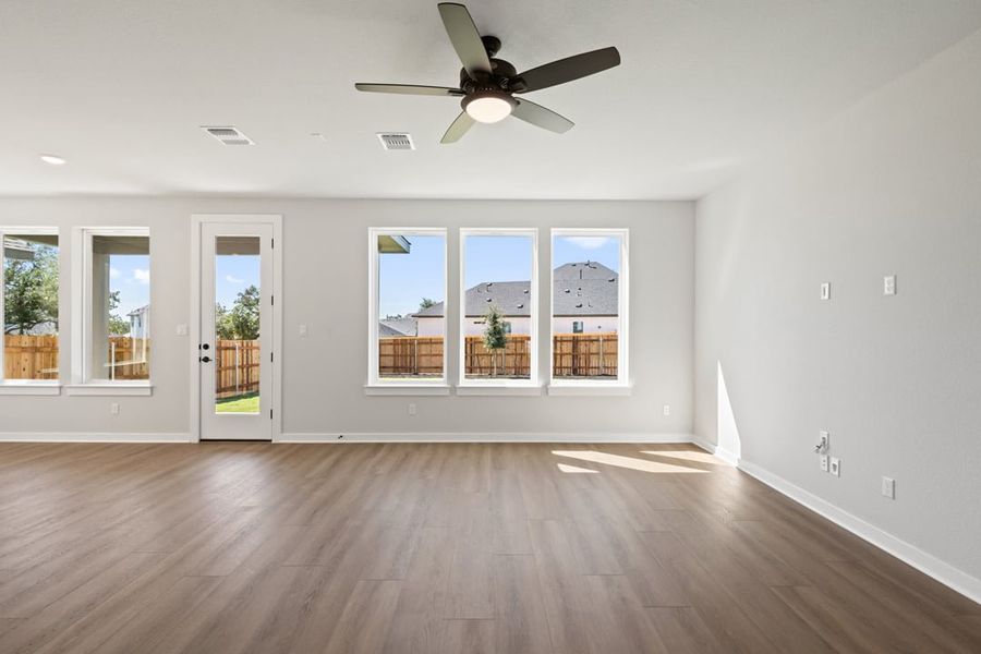 Spacious, unfurnished interior of a new home in Terrace Collection at Heritage, Dripping Springs (Image 21).