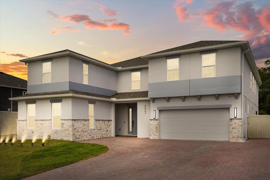 Front exterior of a new home in Bargrove Estates, Mount Dora, FL, highlighting curb appeal (Image 24). Front exterior of a new home in Bargrove Estates, Mount Dora, FL, highlighting curb appeal (Image 24).