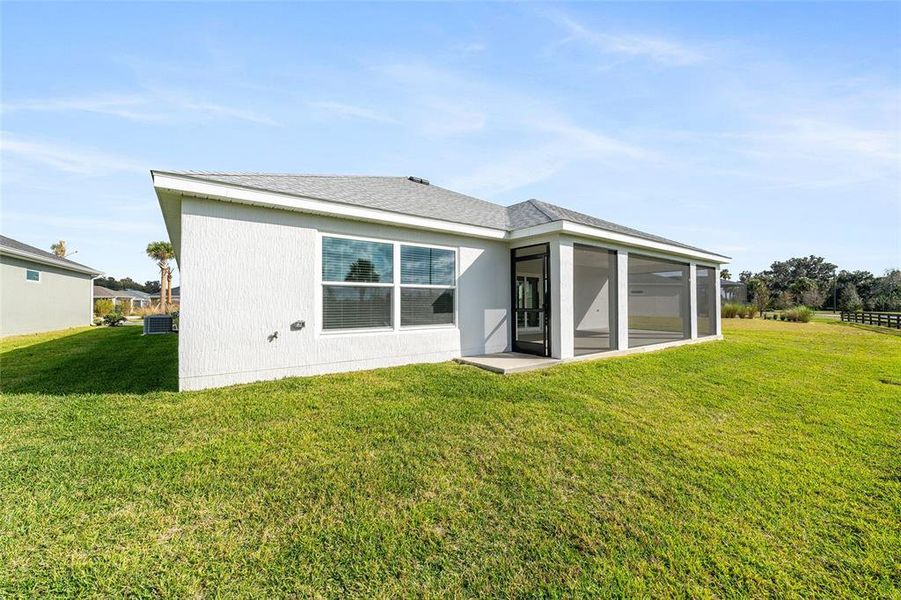 Exterior details and patio area of a home in , The Villages (Image 29).