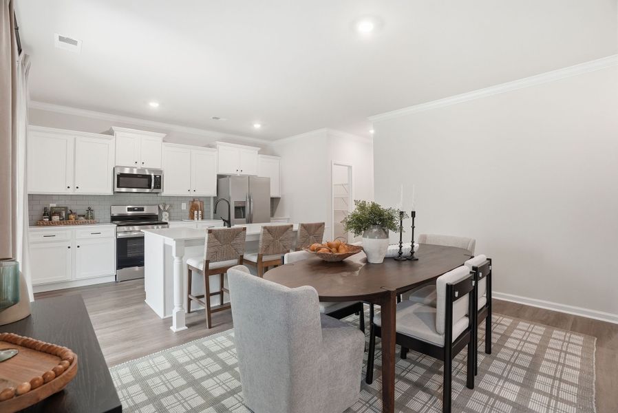 Representative furnished interior of a home built from the Myrtle Select M by McGuinn Homes in Broadway Lake, Anderson (Image 13).
