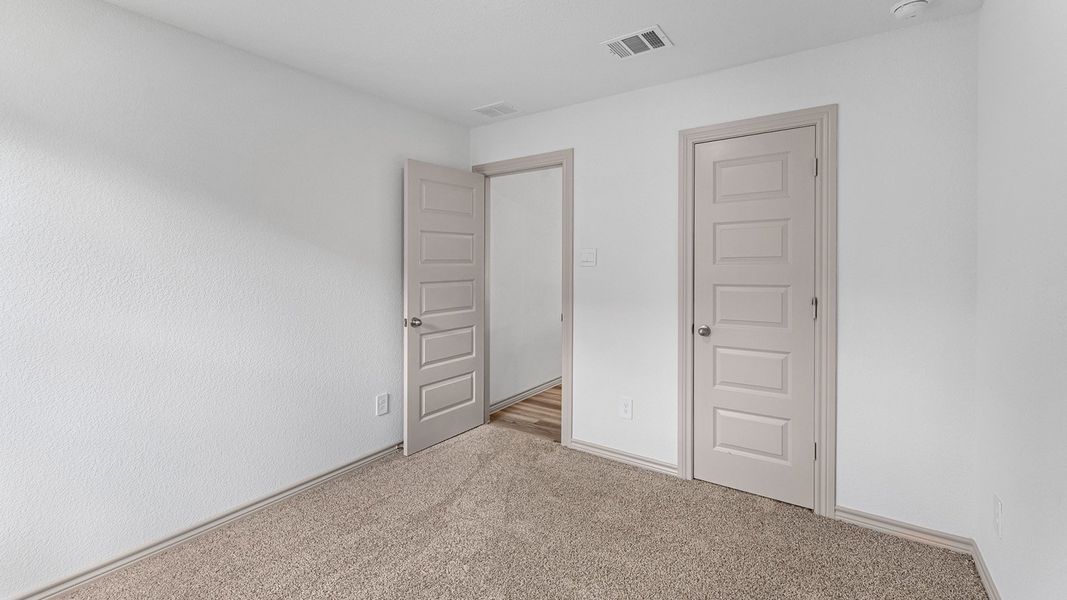 Spacious, unfurnished interior of a new home in Reserve at Mallard Lakes, Orange (Image 16).