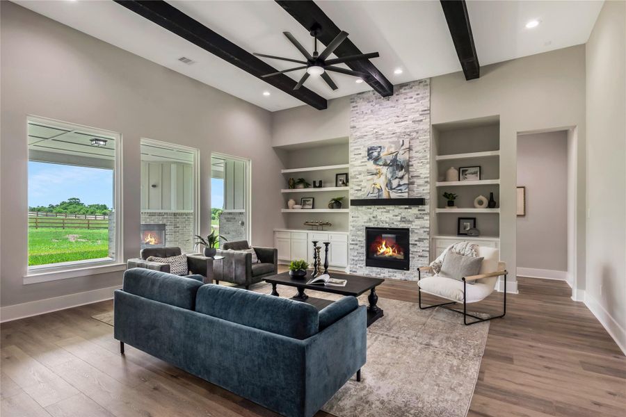 Plenty of natural light and views of the outdoors in this family room Plenty of natural light and views of the outdoors in this family room