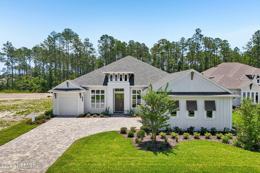 Front exterior of a new home in SilverLeaf, St. Augustine, FL, highlighting curb appeal (Image 24).