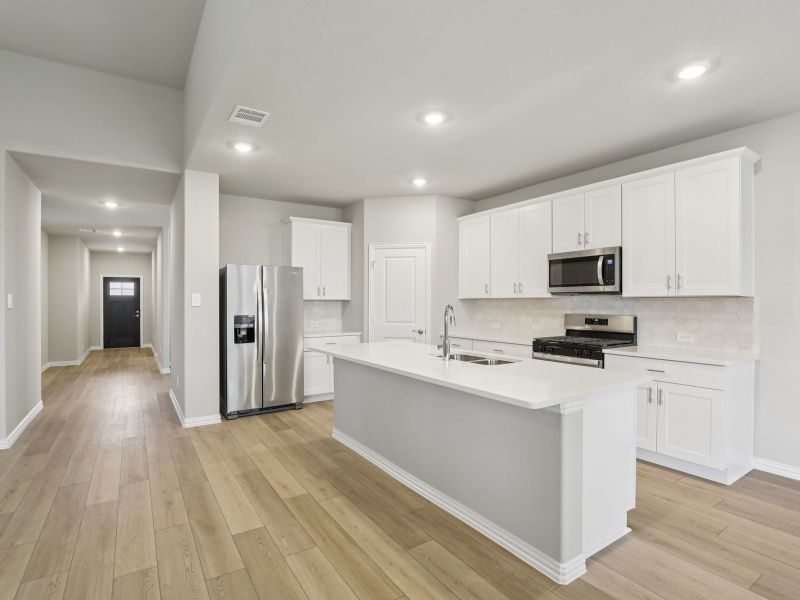 Furnished interior view inside a new home in Parks at Foster Crossing - Premier Series, Anna (Image 6).