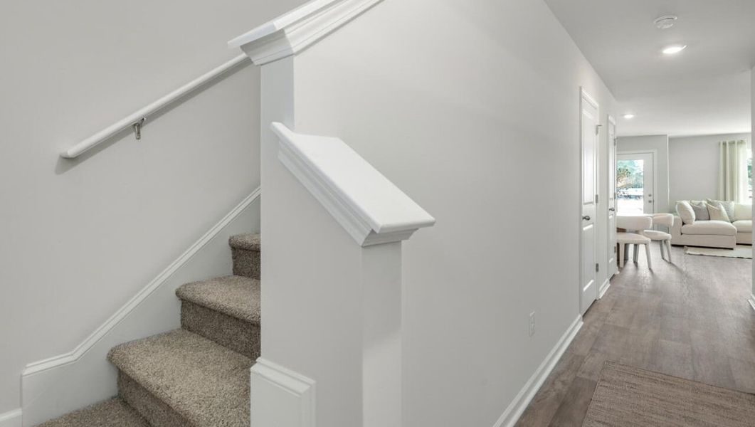 Representative furnished interior of a home built from the PEARSON TH by D.R. Horton in Grayson Park Duets, Leland (Image 17).