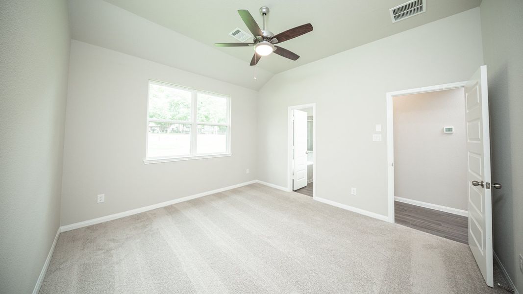 Representative unfurnished interior of a home built from the The Avola - Walden on Lake Conroe by Legend Homes in Lake Conroe Area Homes, Montgomery (Image 12).