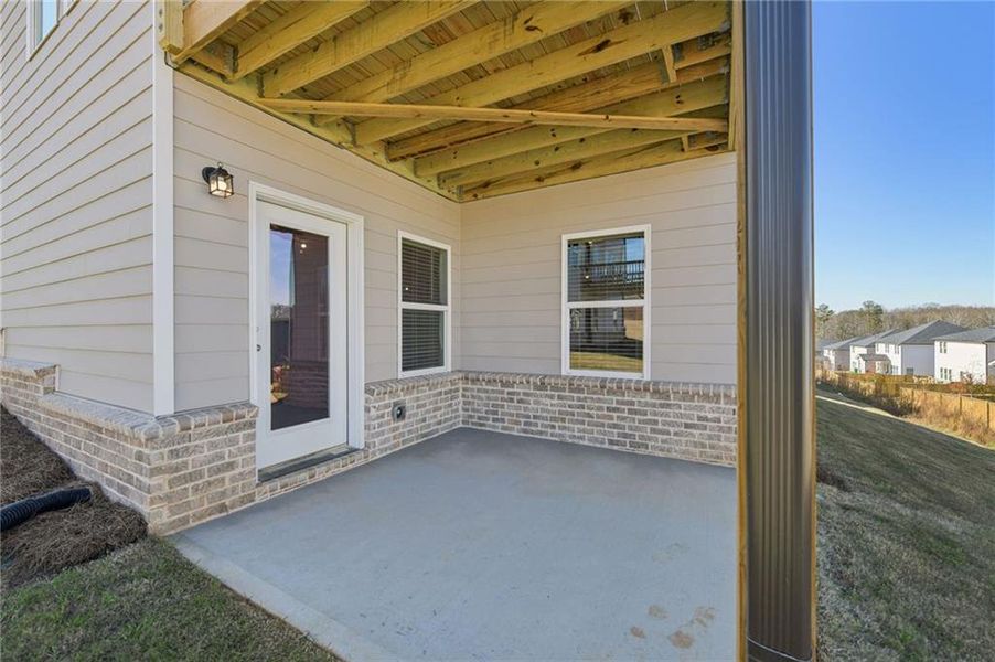 Exterior details and patio area of a home in Preserve at Mountain Creek, Pendergrass (Image 3).