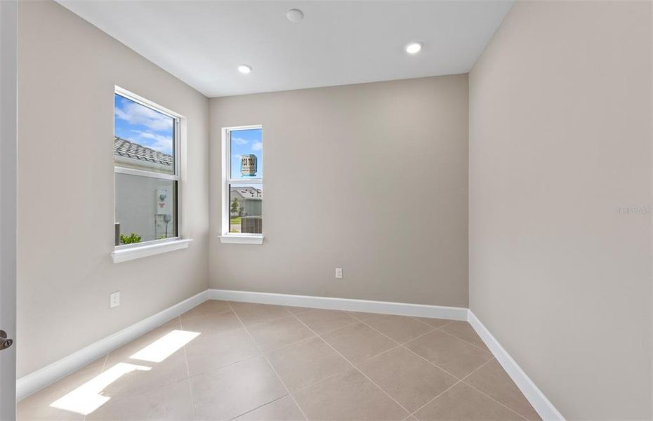 Spacious, unfurnished interior of a new home in BeachWalk by Manasota Key, Englewood (Image 17).