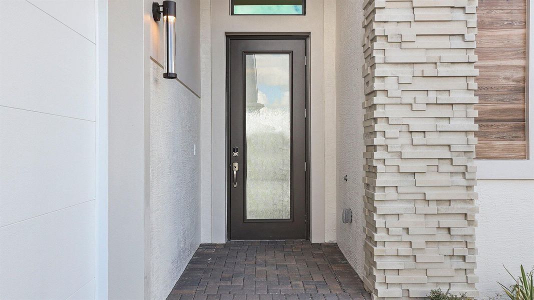 Exterior details and patio area of a home in L'Ambiance at Avenir, Palm Beach Gardens (Image 3). Exterior details and patio area of a home in L'Ambiance at Avenir, Palm Beach Gardens (Image 3).