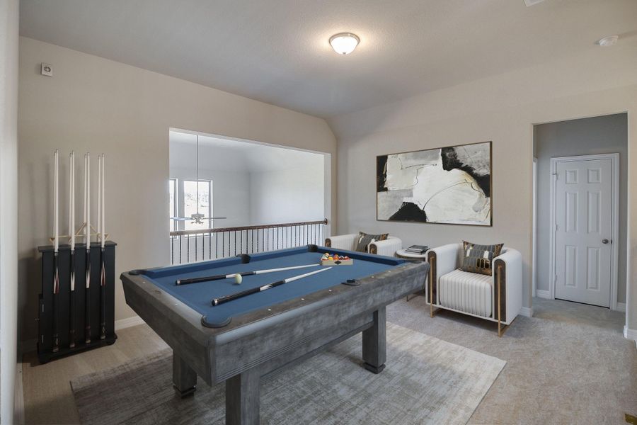 Game room. Note: Sample product photo - actual exterior and interior selections may vary by homesite