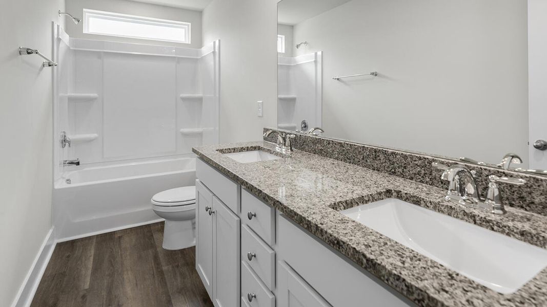 Furnished interior view inside a new home in Surfside Landing, Hubert (Image 15).