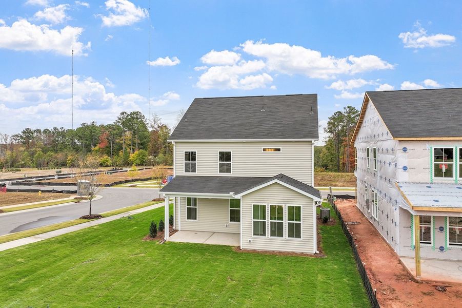 Exterior details and patio area of a home in Renaissance at White Oak, Garner (Image 19).
