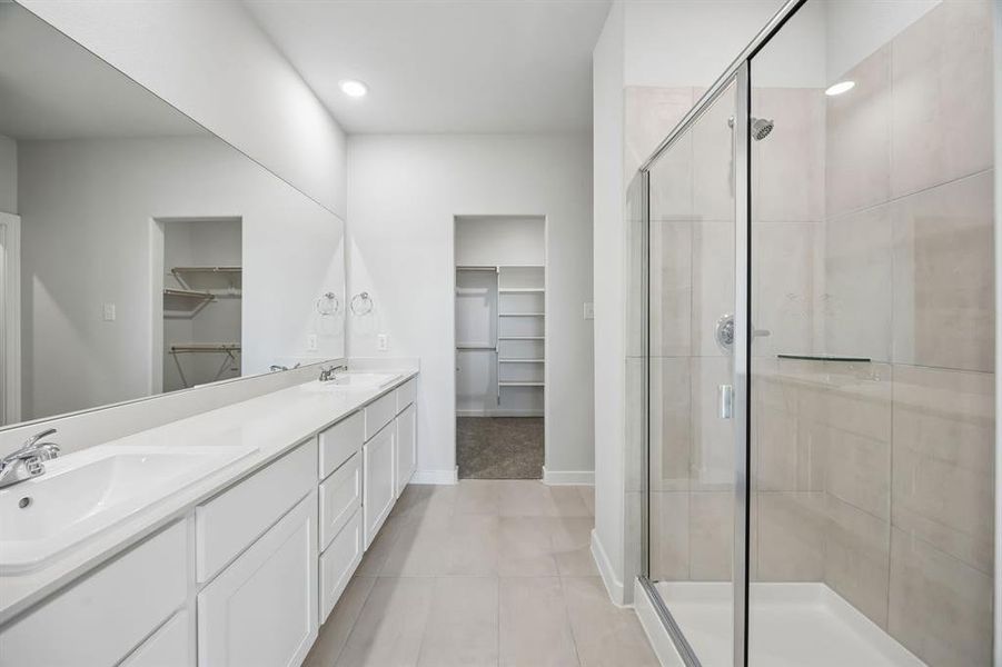 Primary Bathroom in the Mesquite home plan by Trophy Signature Homes – REPRESENTATIVE PHOTO