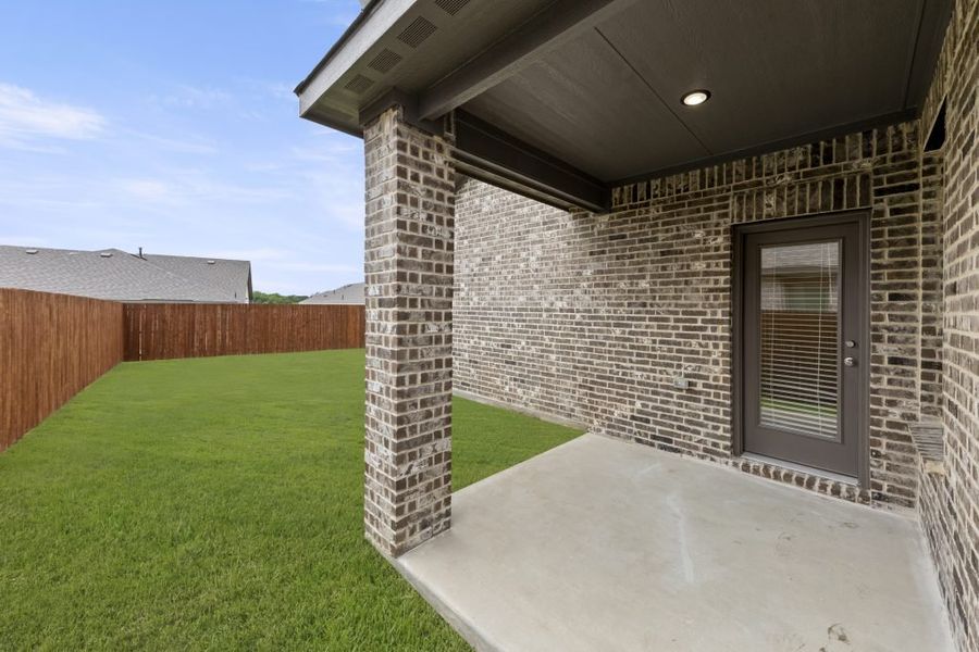 Representative exterior photo of a completed home built from the Maple by Impression Homes in Northspur, Terrell, TX (Image 26).