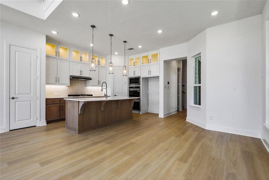 Furnished interior view inside a new home in Walsh: Townhomes - The Patios, Aledo (Image 4). Furnished interior view inside a new home in Walsh: Townhomes - The Patios, Aledo (Image 4).