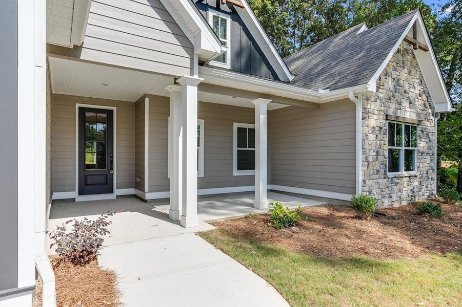 Front exterior of a new home in LOVVORN ESTATES, Carrollton, GA, highlighting curb appeal (Image 25).