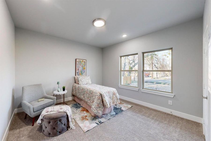 Bedroom featuring carpet