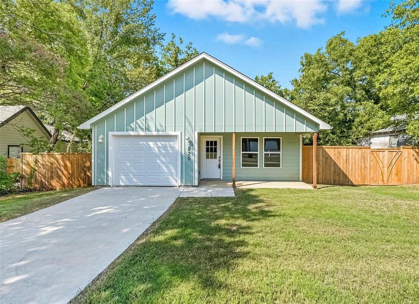 Front exterior of a new home in , Denison, TX, highlighting curb appeal (Image 1).