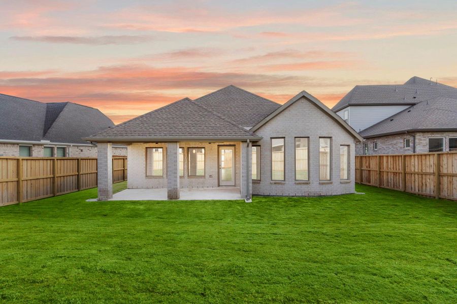 Exterior details and patio area of a home in Dunham Pointe 50', Cypress (Image 24).