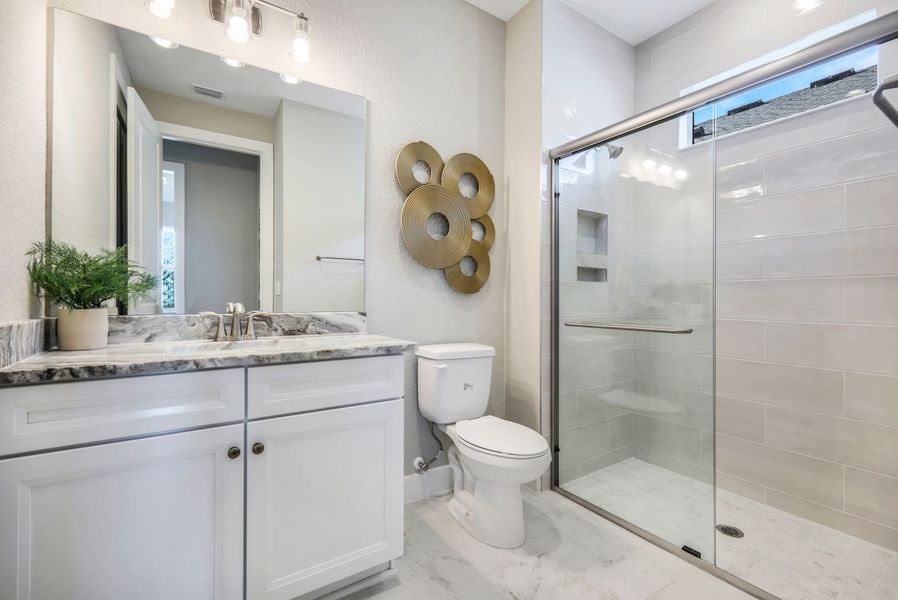 Representative furnished interior of a home built from the Charlotte II by William Ryan Homes in River Preserve Estates, Parrish (Image 16).