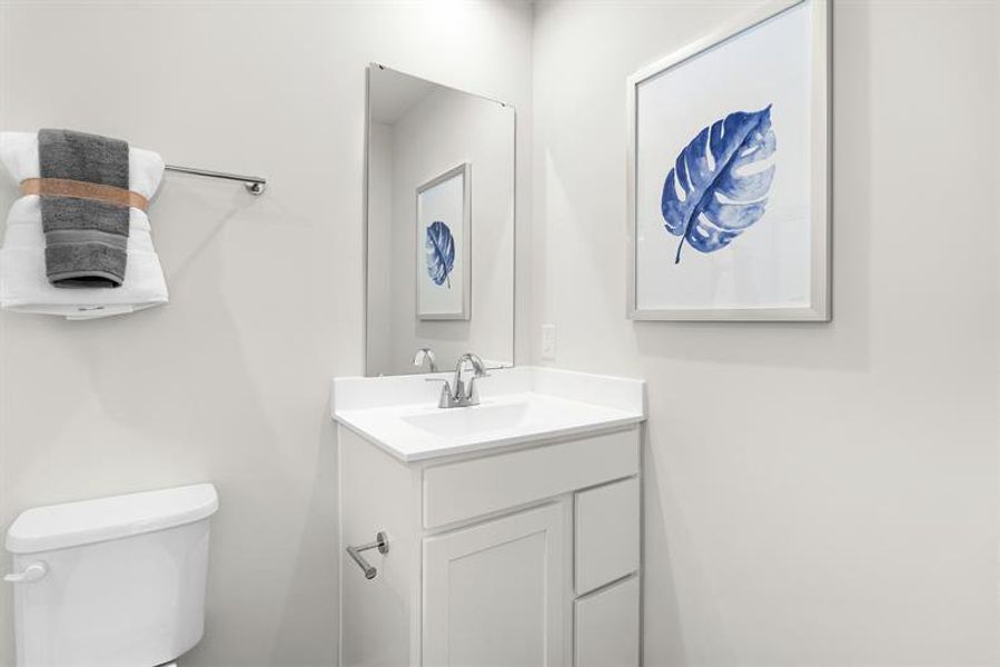 Representative furnished interior of a home built from the Ellis by Ryan Homes in Middle Creek Village Coastal Cottages & Villas, Bolivia (Image 21).