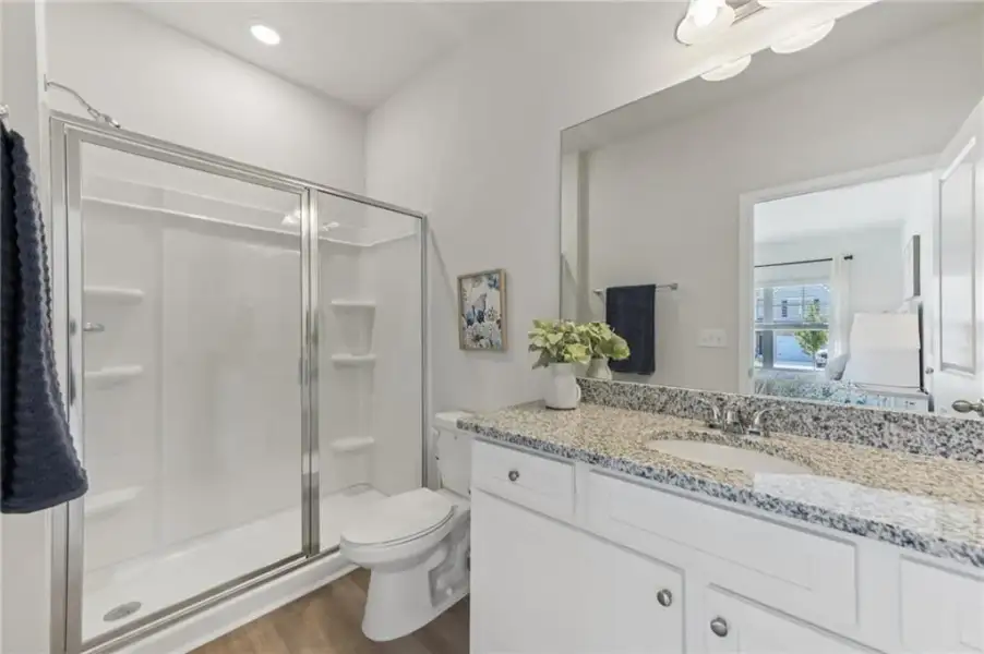Furnished interior view inside a new home in The Hills at Cedar Creek, Winder (Image 9).