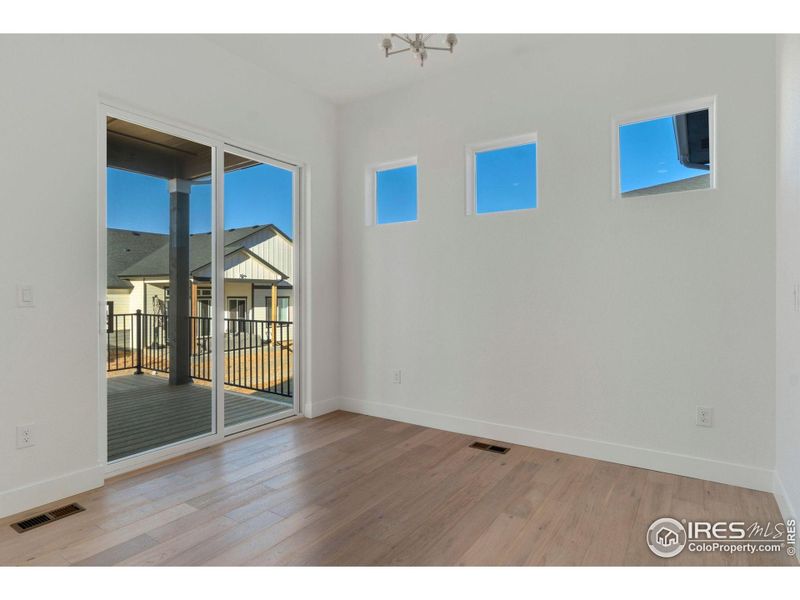 Dining Area off Kitchen with Deck Access