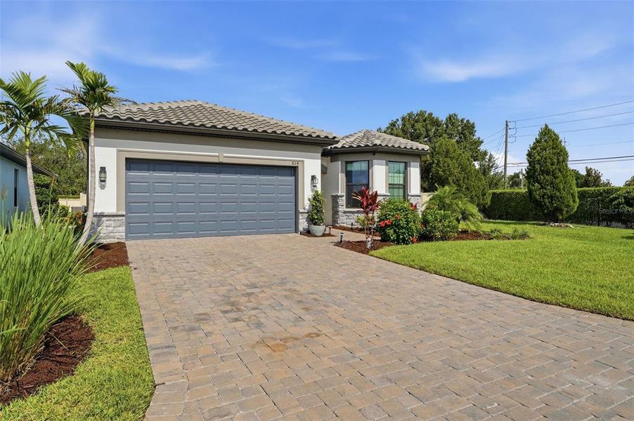 Front exterior of a new home in , Bradenton, FL, highlighting curb appeal (Image 1). Front exterior of a new home in , Bradenton, FL, highlighting curb appeal (Image 1).