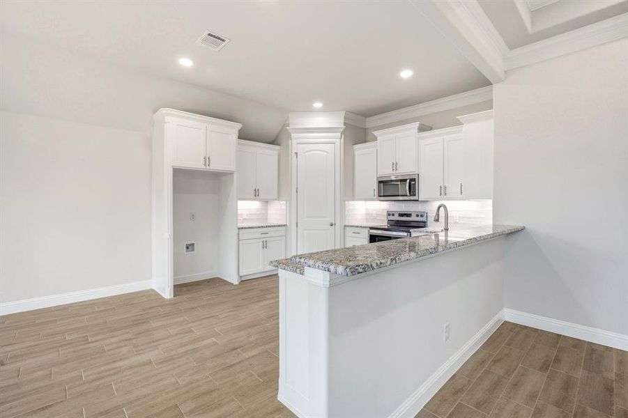 Furnished interior view inside a new home in , Tolar (Image 7).
