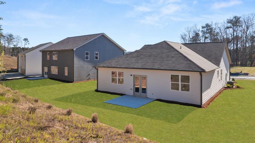 Exterior details and patio area of a home in Northwoods at Mirror Lake, Villa Rica (Image 4).