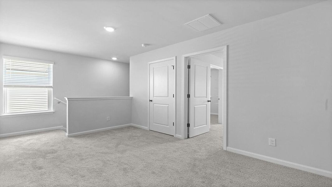 Spacious, unfurnished interior of a new home in Pine Hills at Cane Bay, Summerville (Image 16).