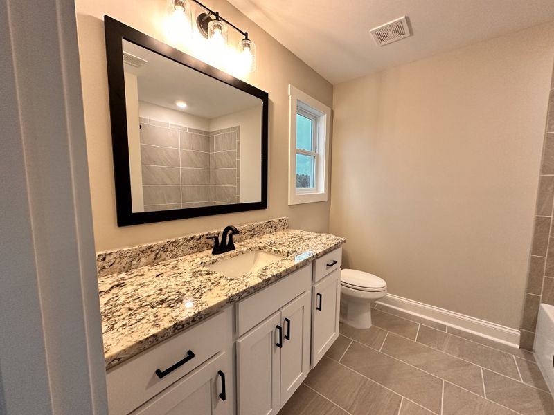Furnished interior view inside a new home in The Reserve at Red Oaks, Carrollton (Image 16).