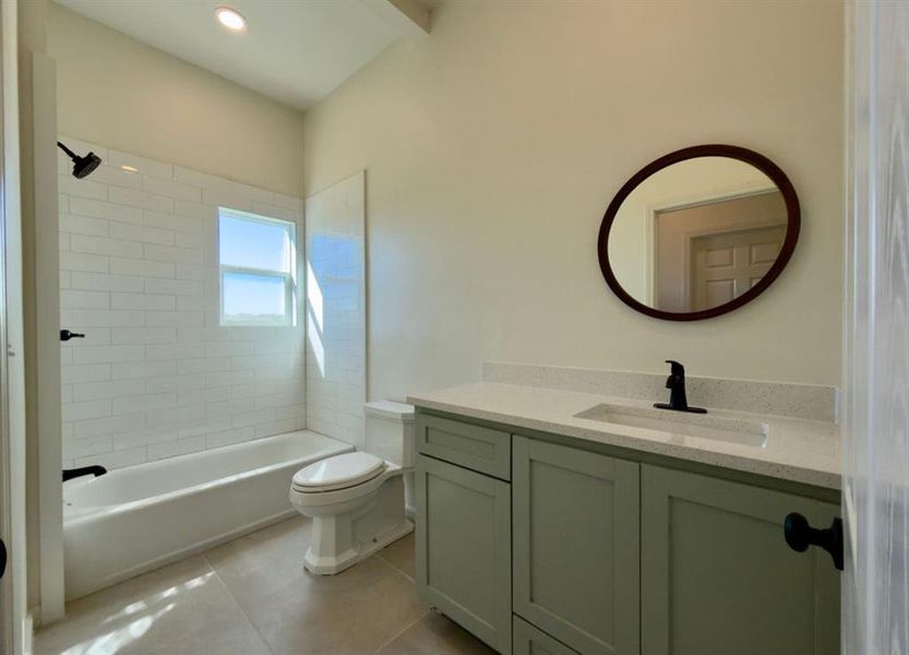 Full bath with vanity, light tile patterned flooring, shower / washtub combination, and beamed ceiling Full bath with vanity, light tile patterned flooring, shower / washtub combination, and beamed ceiling