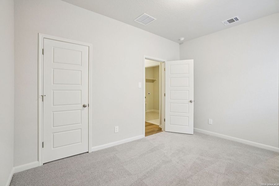 Spacious, unfurnished interior of a new home in Estancia Ranch - Classic Series, San Antonio (Image 20).