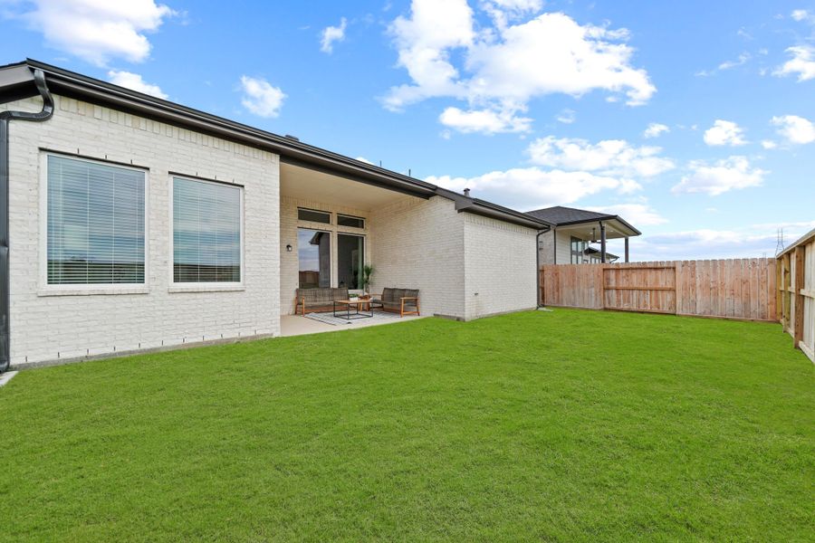 Exterior details and patio area of a home in Attwater, Waller (Image 29).