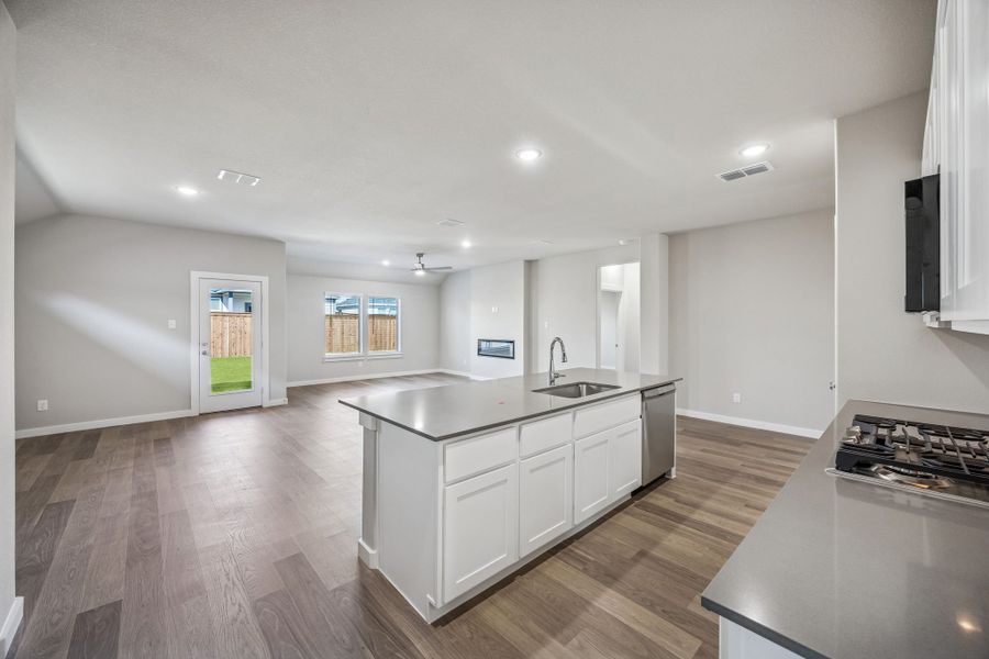 Open Floorplan in the Heisman home plan by Trophy Signature Homes – REPRESENTATIVE PHOTO