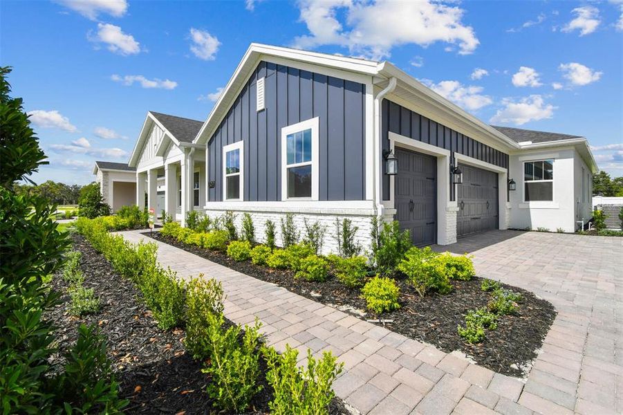 Exterior details and patio area of a home in Solace at Corner Lake, Orlando (Image 42).