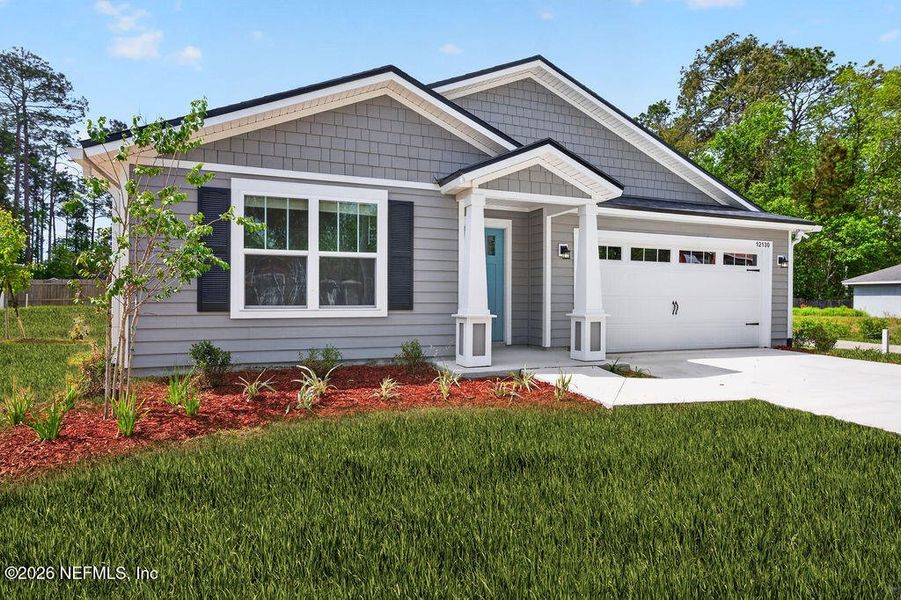 Front exterior of a new home in , Jacksonville, FL, highlighting curb appeal (Image 23).