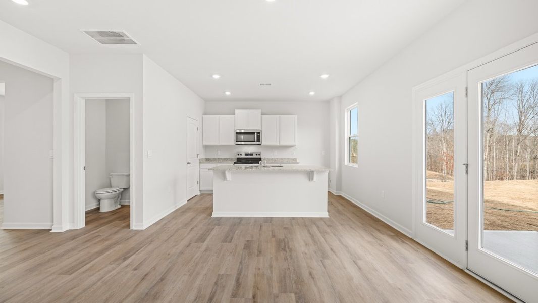 Representative unfurnished interior of a home built from the Penwell by D.R. Horton in Oakleigh Glen, Dallas (Image 11).