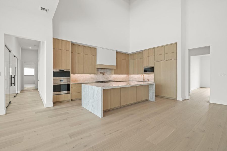 Furnished interior view inside a new home in Bridgeland, Cypress (Image 8).