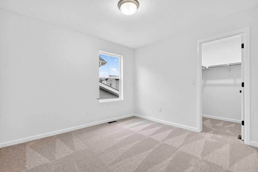 Spacious, unfurnished interior of a new home in Parterre Horizon Collection, Thornton (Image 20).