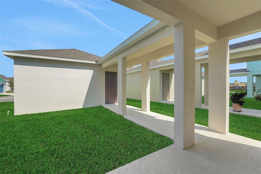 Exterior details and patio area of a home in Crossroads at Kelly Park, Apopka (Image 16).