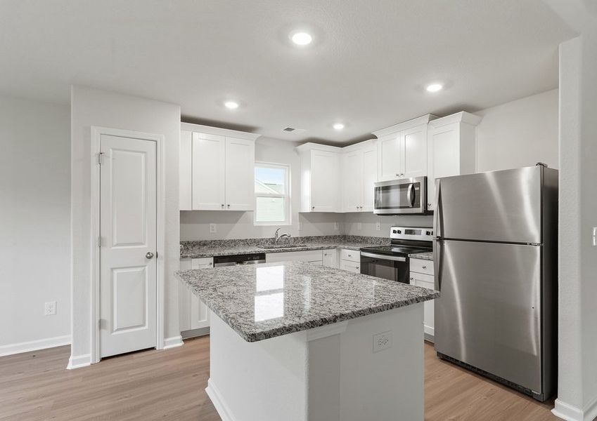 The kitchen has a granite countertop